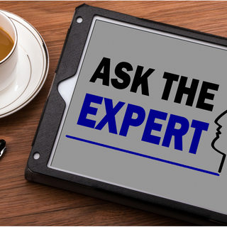 a tablet on a table that reads "Ask the Expert"