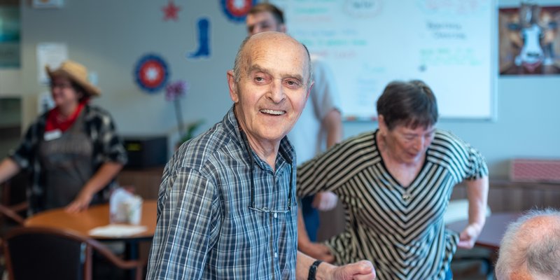 A senior dancing at a party