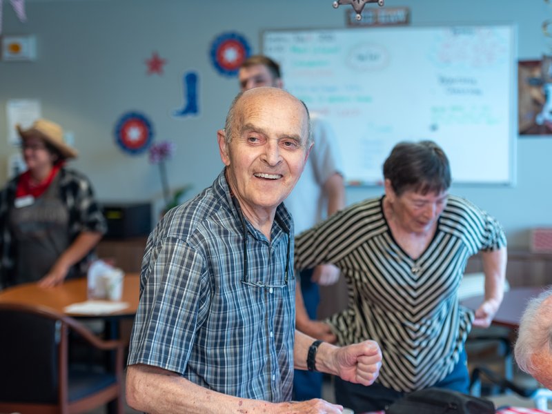 A senior dancing at a party