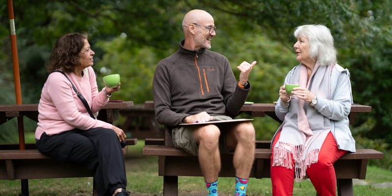 People talking in park