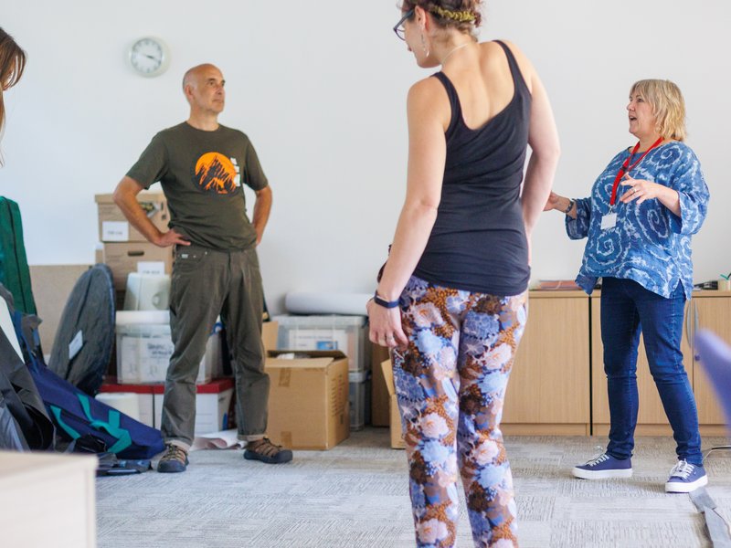 ground of people standing in a exercise class