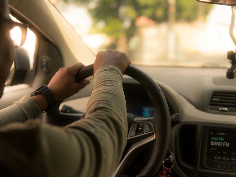 a person driving a car