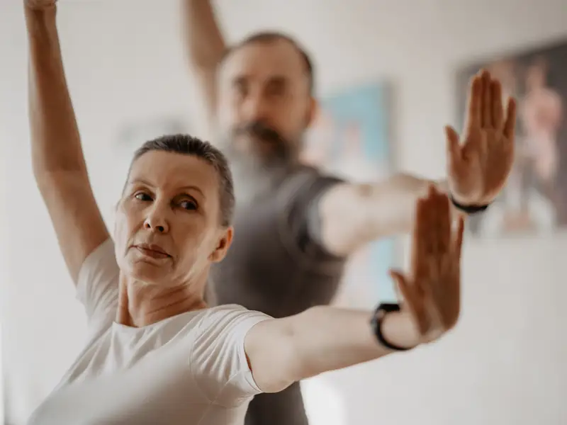 A couple doing yoga