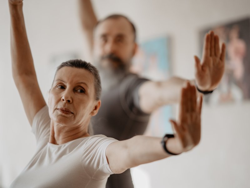 A couple doing yoga