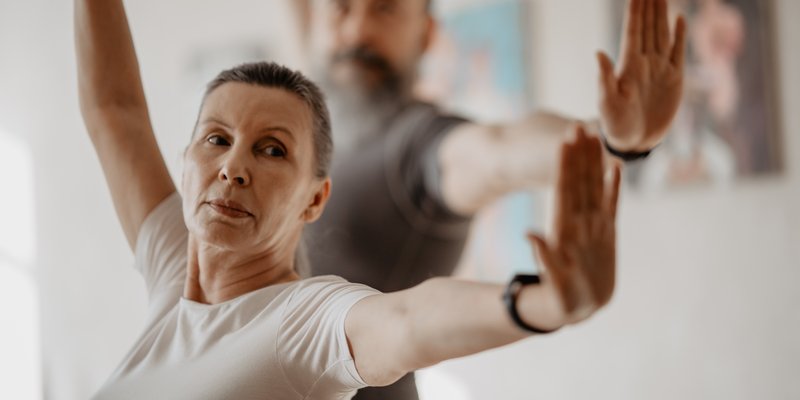 A couple doing yoga